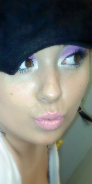 Don't really have a name for this. Purple eyeshadows, white highlight, baby pink lipstick=)