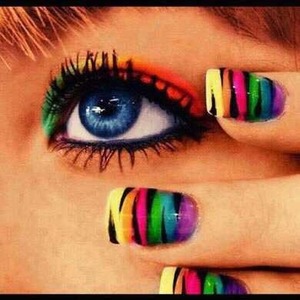 she has pretty eyes and I love her nails!!! and makeup duhh and btw this is not mine. 