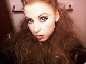 I was bored so I teased my hair and did sort of a 60s cat eye