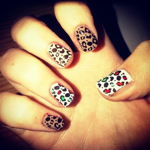 Leopard print nails multi coloured done with the konad stamper 
