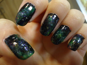my attempt at doing galaxy nails. left hand.