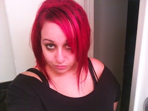 my red hair with black lol lights and my eye makeup
