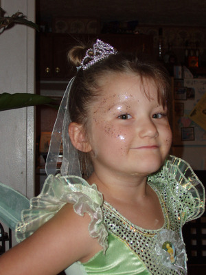 My daughter around age 6. I did my best to turn her into tinkerbell that day. She said she felt like a fairy...ha ha! That's all that matters....right!