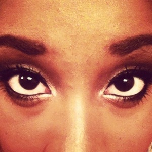 NYE makeup. very gold and smokey with thicker bolder brows