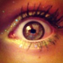 hazel eye, green glitter. :)