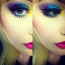 colorful makeup with big blue eyes and pink lipstick
