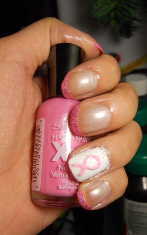 Nail Art for breast cancer awareness month! 

for more info on this nail art, please visite my blog post on it:
http://mileybeauty.wordpress.com/2012/10/09/nail-art-tuesday-pink-ribbon-nails/ 