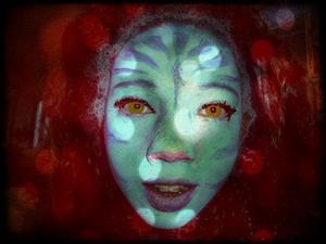 My sister as Neytiri from avatar. Photoshopped the eyes to make them the yellow-ey colour but everything else is done by me