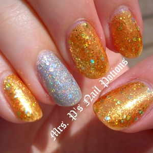 The gold is Mrs. P's Nail Potions Pirate's Booty. The silver is Mrs. P's Nail Potions Hella Holo. Both available at www.etsy.com/shop/MrsPsNailPotions. Pics do not do either polish justice. 
