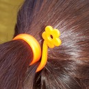 Moni Poni ponytail holder - the revolutionary way to hold your hair!