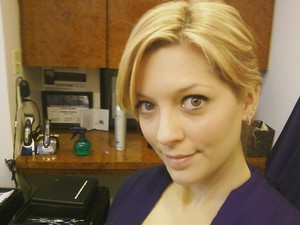 Teaching my coworker Tricia how to do a decent camera phone self-portrait!!!