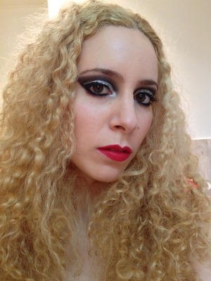 http://michtymaxx.blogspot.com.au/2012/11/bulletproof-jawbreaker.html

For the new Bond film I wanted to do a very dramatic and glamorous look fit for a Bond girl, but I think I ended up with more of a femme fatale appearance.

I was quite happy with it either way and it was a glitzy, silver spin on my usual go-to look. I couldn't resist using the two types of glitter; Eye Kandy Jawbreaker mixes so well with Sugarpill Tiara and M.A.C Reflects 3D Silver is awesome. 
