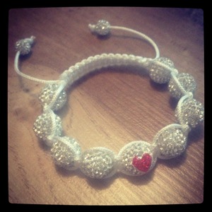 Cute white sparkle bracelet with love heart bead, £28.99!