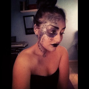 This is my makeup design inspired by a very dark fairy.