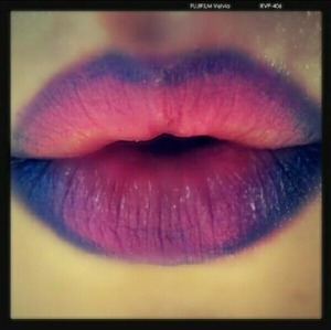 Two lipsticks faded together.
