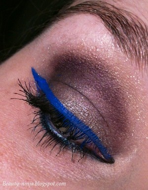 Done entirely with liners. I used Urban Decay 24/7 pencils in Mushroom & Rockstar on my lid & crease as shadows. Then I used Avon Glimmersticks Diamonds in Golden Diamond on my browbone. The bright blue liner is Sephora Smoky Cream Liner in The Deep End. Bottom lashes were lined with UD 24/7 pencil in LSD. Lancome Hypnose Star mascara. 
