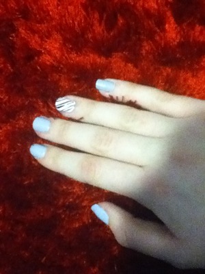 :) Hello Beautylish
so 2 coats of pale purple "Lilacism" Essie polish
and on my ring fingers 2 coats of pale pink "Mod About You" OPI polish
then thick black stripes with my Misa black "Point of no Return" striper
and thinner white ones with my Quo white striper 