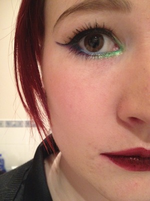 After adding green to the inner corner, purple under the wing and extending it, and a burgandy lip.