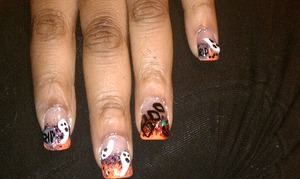 Easy Halloween nails with ghost, pumpkins and headstones. 