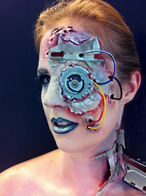 I did this makeup (and fx) for a Cyber theme.
I used Kryolan's putty and Sillicons for the fx.