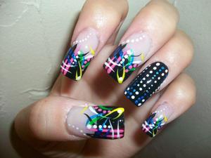 Fun hand painted abstract design with a black tip.