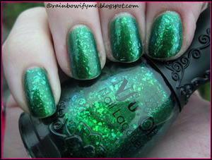 This is Nfu Oh number 056, a gorgeous green flakie, layered over Wet N Wild.
Read more about it on my blog: 
http://rainbowifyme.blogspot.com/2011/11/nfu-oh-056.html