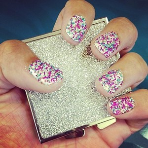 Multi Colored Nail Pearls on White Nail Polish to give that sprinkle effect!