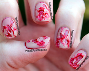 This special effects design is perfect for Halloween!! 

The blood is Sinful Colors Ruby Ruby and the flesh is OPI Samoan Sand. I also used Butter London's Matte Finish Topcoat!

http://packapunchpolish.blogspot.com/2012/10/bloody-ripped-flesh-halloween-nail-art.html
