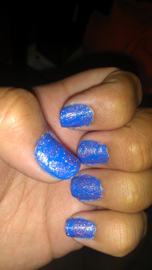 BLUE POLISH AS A BACKGROUND COLOR AND THE NEW CRACKLE GLAZE ON TOP WITH A CLEAR TOP COAT