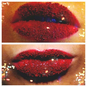 Red caviar beads on red lipstick