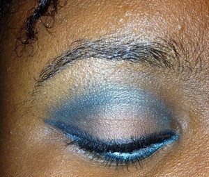 Aqua blue in the crease by ElF
Brown on the lid by ELF
Tan as the highlight by Elf
Blue black gel liner by Mabeline 