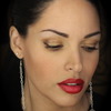 Red lips and golden eyes http://thedressychick.com