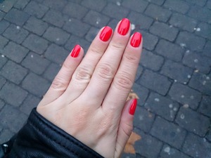 OPI Cajun Shrimp is a vibrant shade of red, perfect to brighten up the mood on a gloomy autumn day.