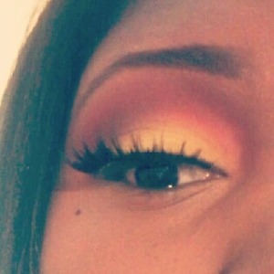 i used yellow orange and red eyeshadow from Blush Professional palette. I also used NYX pencil in white as a base.