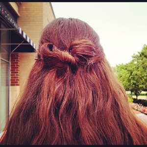 I did this bow hairstyle on myself. 