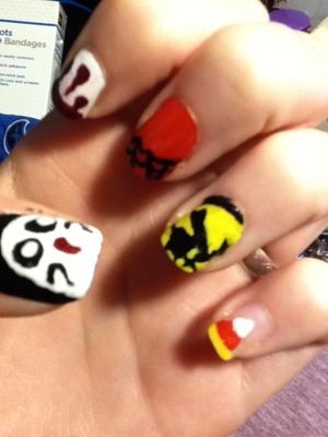 Halloween themed nails ^_^ The ghost is my personal favorite. Candy corn comes in second.