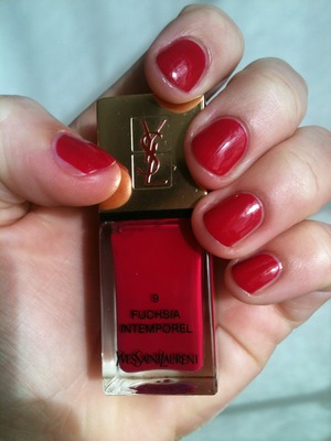 Two coats of YSL Fuchsia Intemporel, with a top coat from Trind. The color looks a bit more red in this picture, it is actually a nice deep reddish/pink tint. 