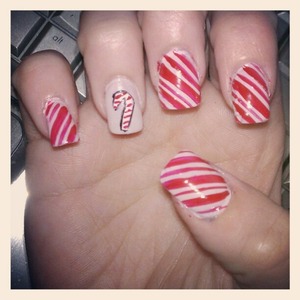 candy cane stripes with a candy cane on my ring finger 