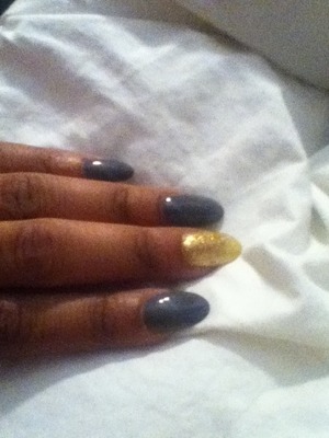 Essie in the color "Chinchilly" and an unknown gold glitter polish 