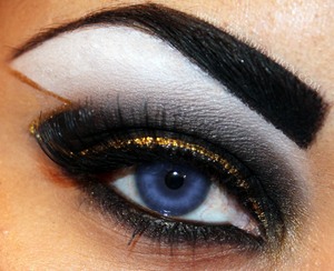 Inspired by Storm of the X-Men

http://makeupbysiryn.com/2012/06/13/storm-inspired-look/