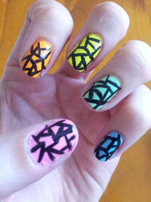 Different coloured nails tied in with black abstract lines