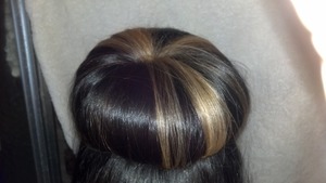 ombre hair with a big donut or 'sock bun' style, but not using a sock bun