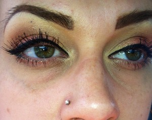 Pale gold shimmer with a hot pink and a retro eyeliner