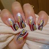 Abstract Red, gold, black and white nails