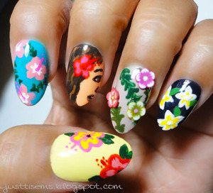 Went for a whole Hawaiian floral theme http://justtisems.blogspot.com/2012/09/nails-done-lei-you-down.html
Base colors were the only polishes I used.  Not including top or base coats.  The rest was acrylic paints.