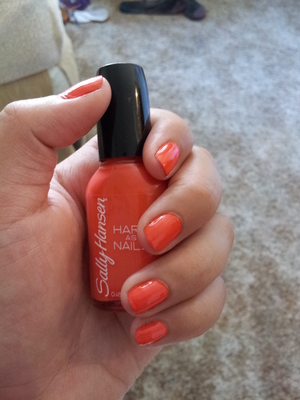 I couldn't find the nail polish in "products used", but its Sally Hansen Hard As Nail in Might Mango (420)