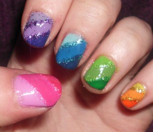 Day 9: Rainbow nails. Phew well I used 15 colours and 5 glitters for this one. 