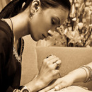 Applying henna at a Henna party