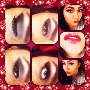 Pink/purple/black smokey eye makeup
Red lips