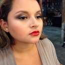 Neutral eye look with a bold lip